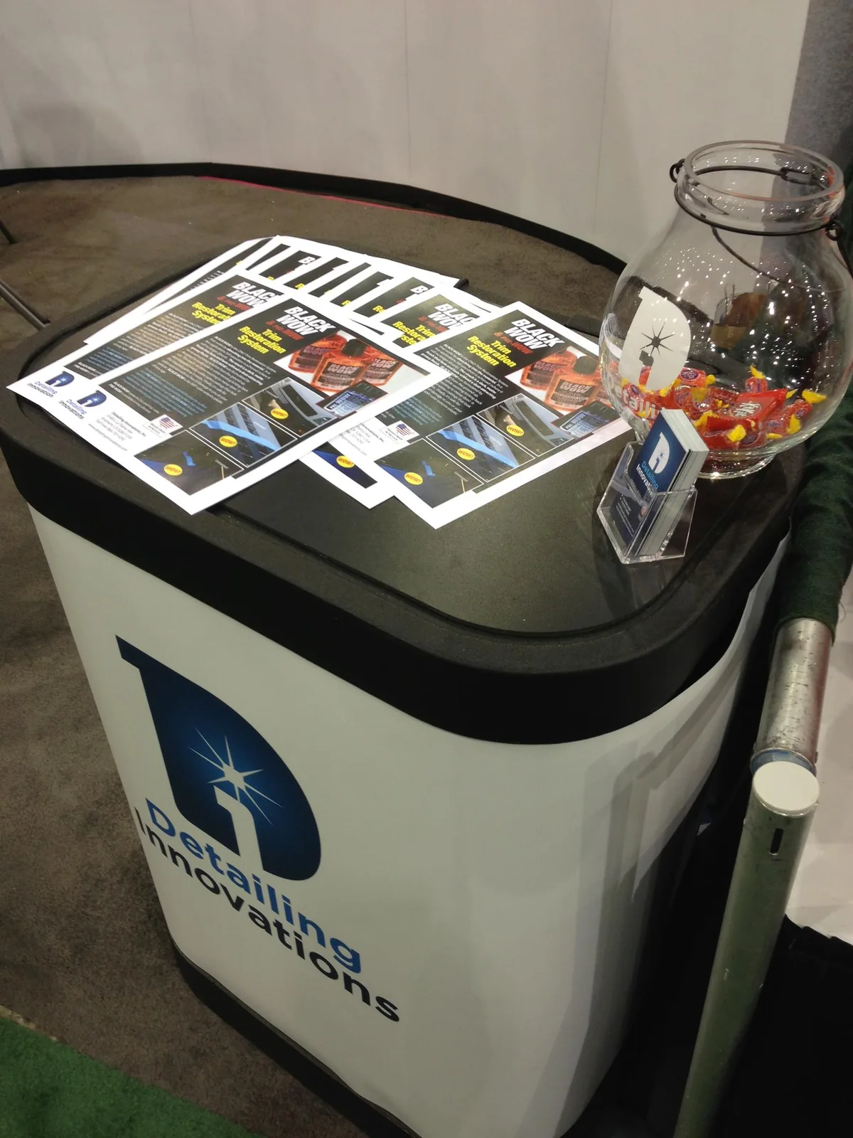 The DI branded podium — a SEMA staple